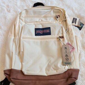 Unisex XL JanSport Coconut color with a brown synthetic leather base.